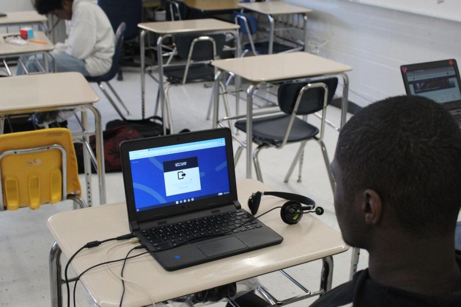 Freshman Michael Terry sits in his Spanish 1 class, which is being taught online by a Stride teacher. Michael goes to class and has a teacher in the room, but the instruction is virtual.